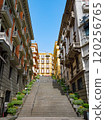 Street with stairs leading up without people in Naples, Italy taken on sunny day. 120256765