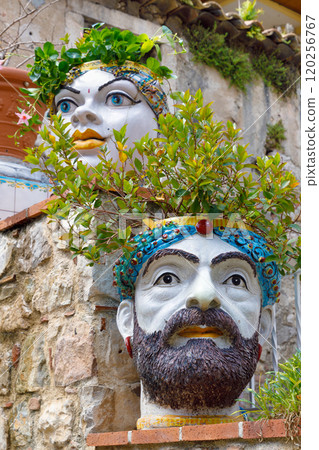 Traditional Testa di Moro planter on Taormina balcony 120256767