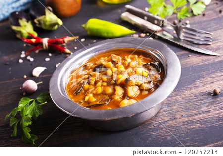 Vegetable stew. in metal bowl. Hot foodstuff. Vegetable stew. in metal bowl. Hot foodstuff. 120257213