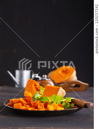 Autumn pumpkin on dark background 120257242