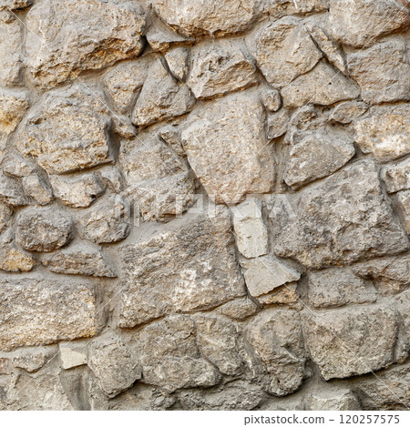 Processed pattern background of old medieval stone wall texture in daylight. Background for banner, backdrop or texture for 3D mapping 120257575