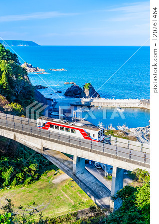 Sanriku Railway A train crossing the Osawa Bridge with the Pacific Ocean in the background 120261464