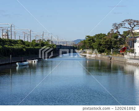 The waterway of Lake Hamana and the overhead wires of the Tokaido Shinkansen 120261892