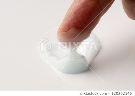 Close-up of fingers applying hand cream Close-up of fingers applying hand cream 120262146