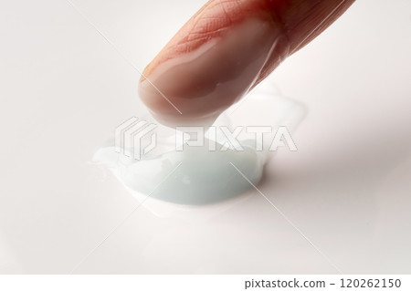 Close-up of fingers applying hand cream Close-up of fingers applying hand cream 120262150