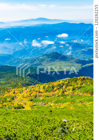 Climbing Mt. Ontake in autumn: View from the hiking trail (from the 8th station stone refuge hut to the summit of Otaki) 120262255