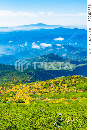 Climbing Mt. Ontake in autumn: View from the hiking trail (from the 8th station stone refuge hut to the summit of Otaki) 120262256