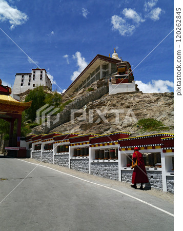 Tibetan monks walking along the approach to Thiksey Gompa in the western part of Ladakh, known as Little Tibet in northern India. Tibetan monks walking along the approach to Thiksey Gompa in the western part of Ladakh, known as Little Tibet in northern India. 120262845