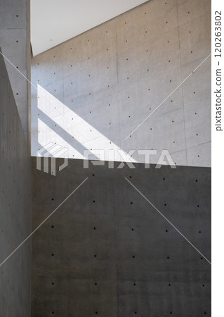 Abstract, minimalist, modern architectural space with concrete walls and curved element 120263802