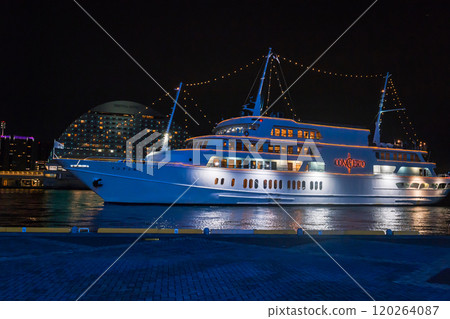 A tourist boat arrives at Takahama quay in Kobe Port at dusk, October 17, Japan 120264087