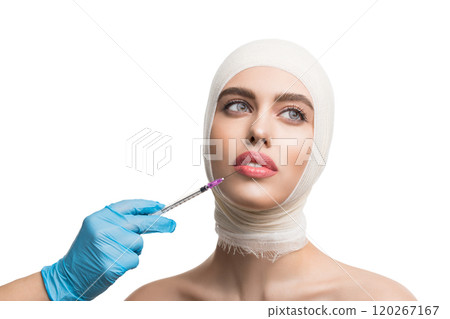 Girl her head bandaged getting beauty injections 120267167