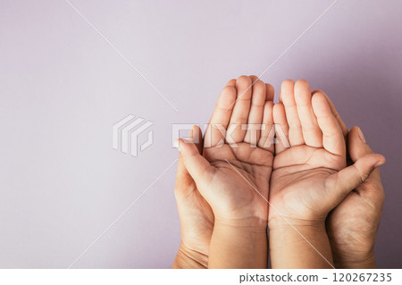Family Day, Parents and kid hold empty hands top view isolated. Portraying togetherness support and the bond passed across generations. Family Day, Parents and kid hold empty hands top view isolated. Portraying togetherness support and the bond passed across generations. 120267235