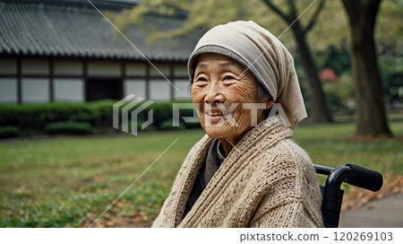 Smiling senior woman in a wheelchair Smiling senior woman in a wheelchair 120269103