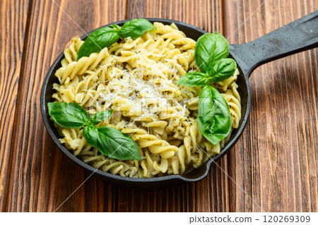 Pasta with basil sauce pesto . Italian food photography . Top view Pasta with basil sauce pesto . Italian food photography . Top view 120269309