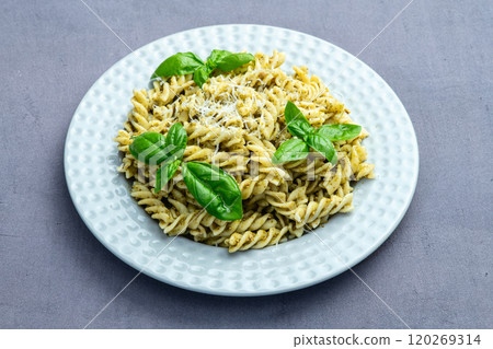 Pasta with basil sauce pesto . Italian food photography . Top view Pasta with basil sauce pesto . Italian food photography . Top view 120269314