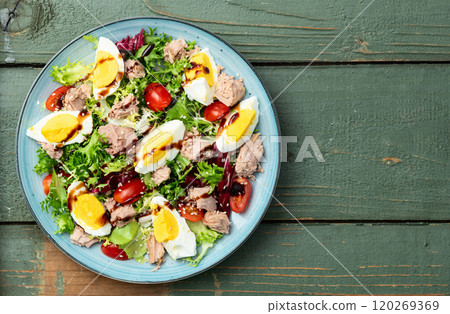 Canned Tuna salad with eggs and tomatoes photography . Top view 120269369