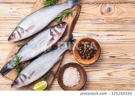 Raw sea bass fish photography . Top view 120269389