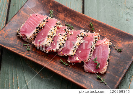 Sliced tuna steak with sesame photography . Top view 120269545