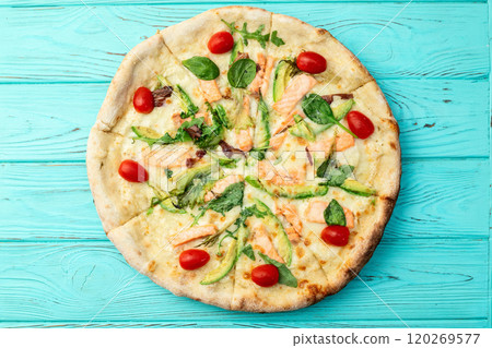 Italian pizza with avocado salmon  tomatoes and mozzarella photography. top view 120269577