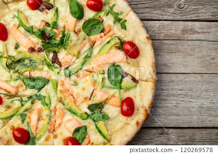 Italian pizza with avocado salmon  tomatoes and mozzarella photography. top view 120269578