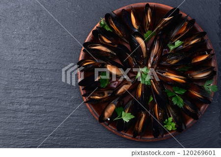 Mussels with parsley on a plate photography Mussels with parsley on a plate photography 120269601