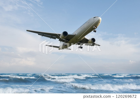 Jet plane in rough seas, passenger plane taking off from coast Jet plane in rough seas, passenger plane taking off from coast 120269672