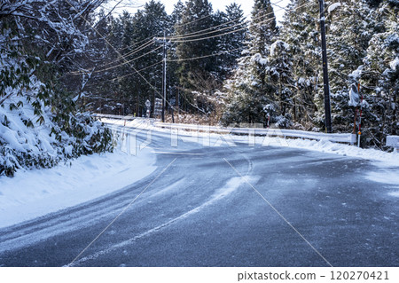 Snowy road, icy road (near Oyama Kyoganari) 120270421