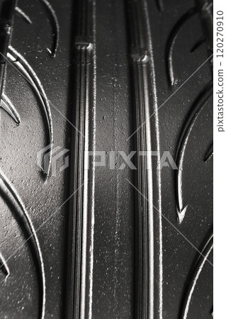 Close up of the tread surface of a used car tire Close up of the tread surface of a used car tire 120270910