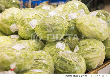 Cabbage section of a supermarket 120271096