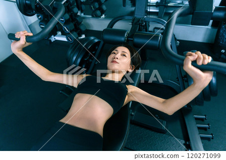 woman training at the gym woman training at the gym 120271099