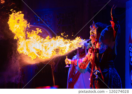 Chinese actor performs a public traditional changing face performance onstage in Chengdu, China Chinese actor performs a public traditional changing face performance onstage in Chengdu, China 120274028