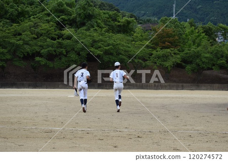 A boy playing baseball A boy playing baseball 120274572