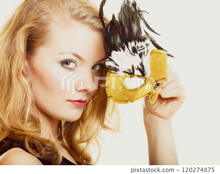 Masquerade. Beautiful girl in carnival mask 120274875