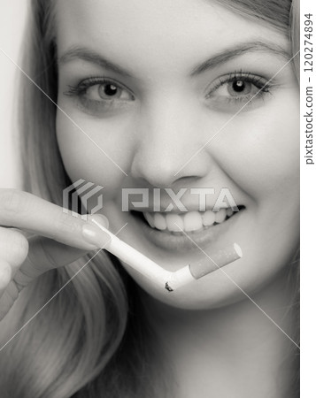 Girl break down cigarette. 120274894
