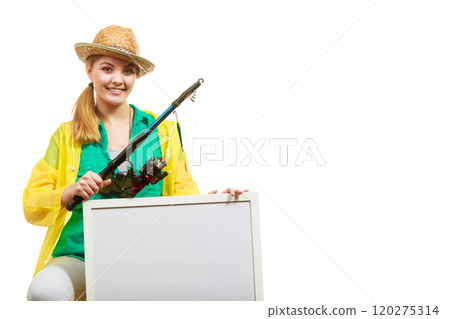 Happy woman with fishing rod holding board 120275314