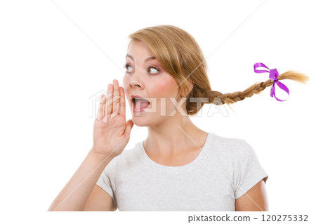 Teenage girl in braid hair talking rumors 120275332