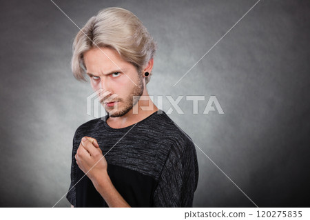 Angry serious young man, negative emotion Angry serious young man, negative emotion 120275835