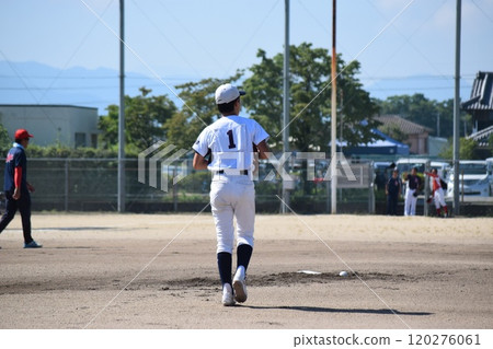 Boy playing baseball, back view 120276061