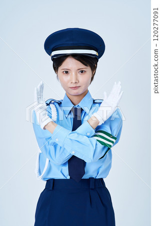 A female security guard making a pose to stop 120277091