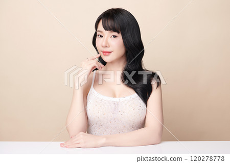 Beautiful young asian woman with clean fresh skin on beige background, Face care, Facial treatment, Cosmetology, beauty and spa, Asian women portrait. 120278778