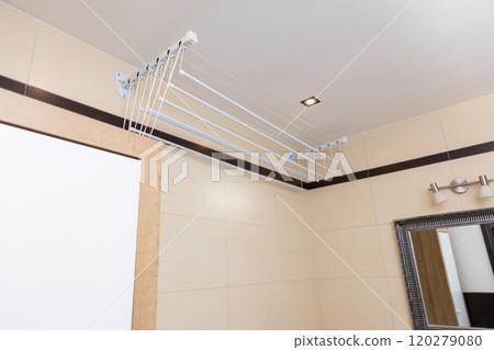 The Innovative Ceiling Drying Rack for Bathrooms combines functionality and aesthetics seamlessly The Innovative Ceiling Drying Rack for Bathrooms combines functionality and aesthetics seamlessly 120279080
