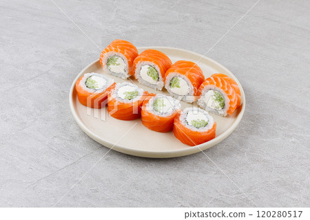 Japanese Sushi Rolls Philadelphia Uramaki Plate on Gray Background for Restaurant Menu or Food Delivery Japanese Sushi Rolls Philadelphia Uramaki Plate on Gray Background for Restaurant Menu or Food Delivery 120280517