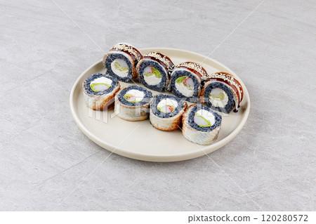 Japanese Sushi Rolls Philadelphia Uramaki Plate on Gray Background for Restaurant Menu or Food Delivery Japanese Sushi Rolls Philadelphia Uramaki Plate on Gray Background for Restaurant Menu or Food Delivery 120280572