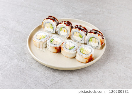 Japanese Sushi Rolls Philadelphia Uramaki Plate on Gray Background for Restaurant Menu or Food Delivery Japanese Sushi Rolls Philadelphia Uramaki Plate on Gray Background for Restaurant Menu or Food Delivery 120280581