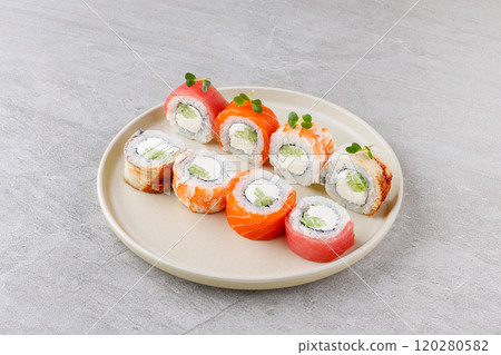 Japanese Sushi Rolls Philadelphia Uramaki Plate on Gray Background for Restaurant Menu or Food Delivery 120280582