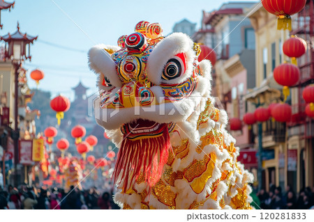 Chinese new year A large dragon costume is on display in a busy street. The dragon is surrounded by many people, some of whom are holding lanterns. The atmosphere is lively and festive 120281833