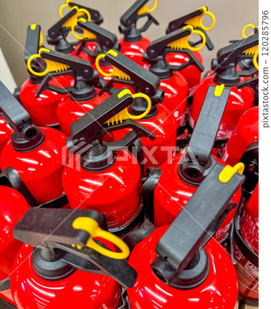 Close-Up of Red Fire Extinguishers in Hardware Store Display. High quality photo Close-Up of Red Fire Extinguishers in Hardware Store Display. High quality photo 120285796