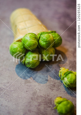 Creative Brussels Sprouts in Waffle Cone - Unique Healthy Food Concept. High quality photo 120285828