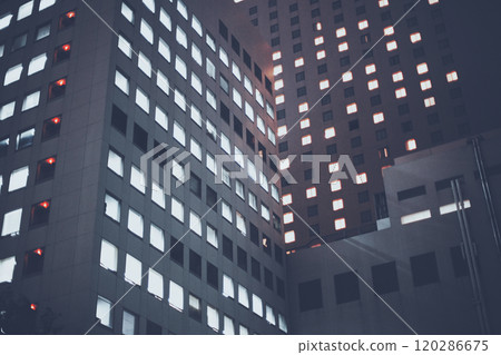 Office building windows at night 120286675