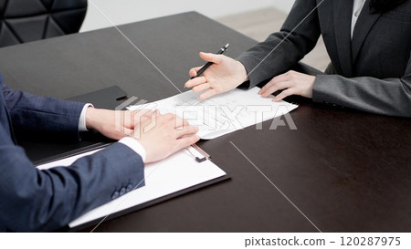 Lawyer explaining the contract Lawyer explaining the contract 120287975